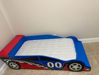 Toddler race car bed with matters