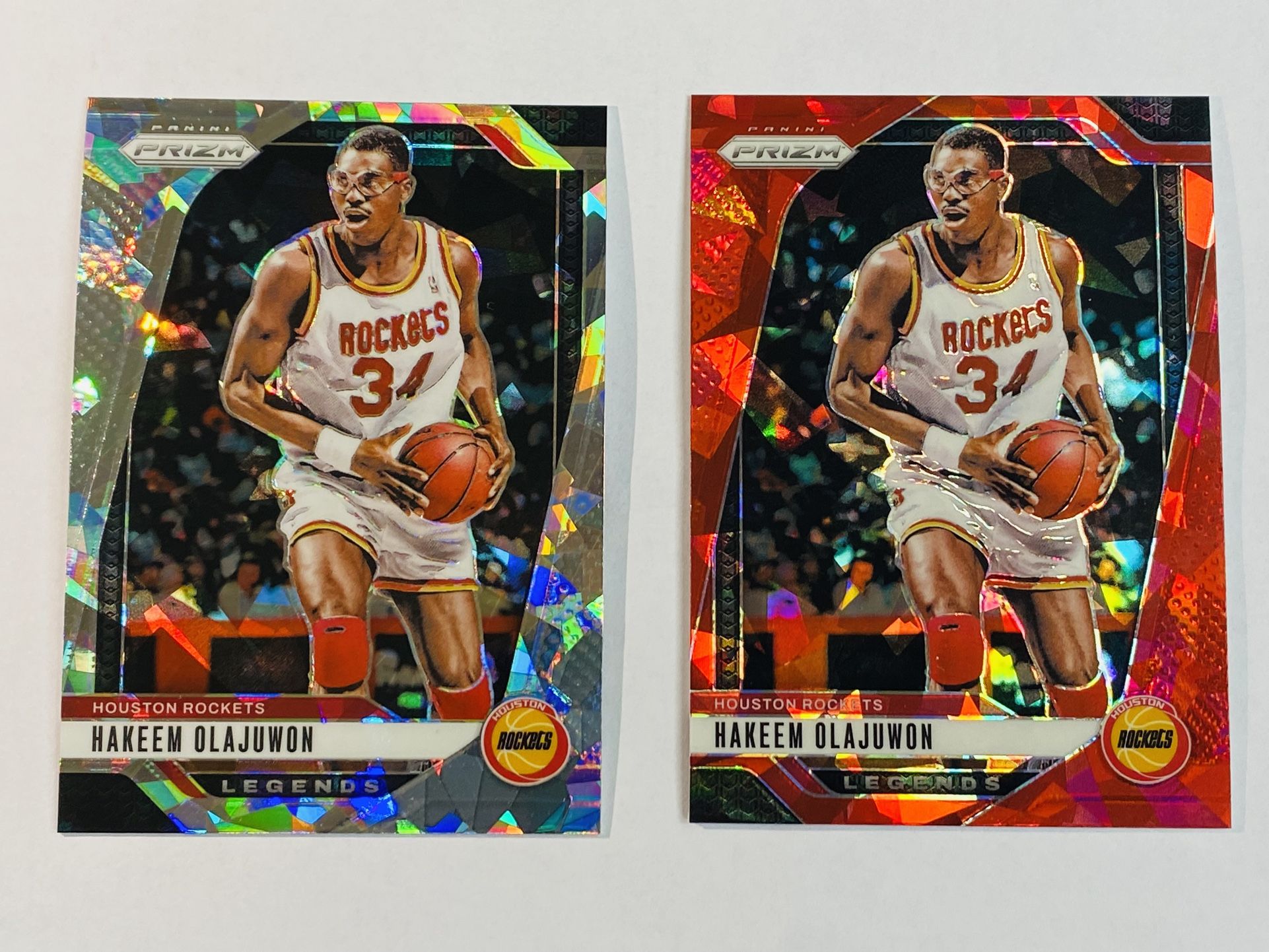 2024-25 Panini Prizm Basketball Hakeem Olajuwon #296 Cracked Ice and Red Ice