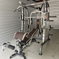 READ DESCRIPTION BELOW BEFORE MESSAGING ME.  Marcy MD-9010G  Smith Machine Home Gym  w/  Weights. DELIVERY AVAIL. FIRM PRICE.