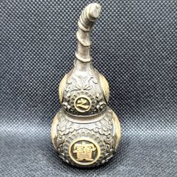 Antique-style gourd ornament for home decoration.