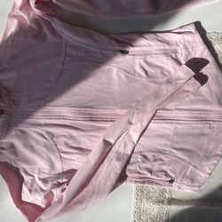 Women’s pink lululemon jacket size 4