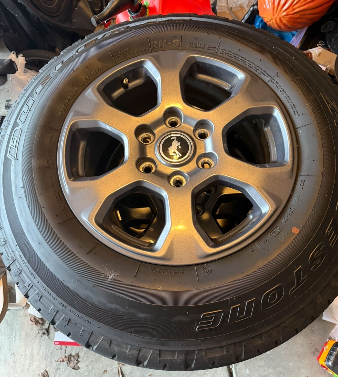 Bridgestone Dueler A/T Tires + OEM Bronco Rims - Set of 5