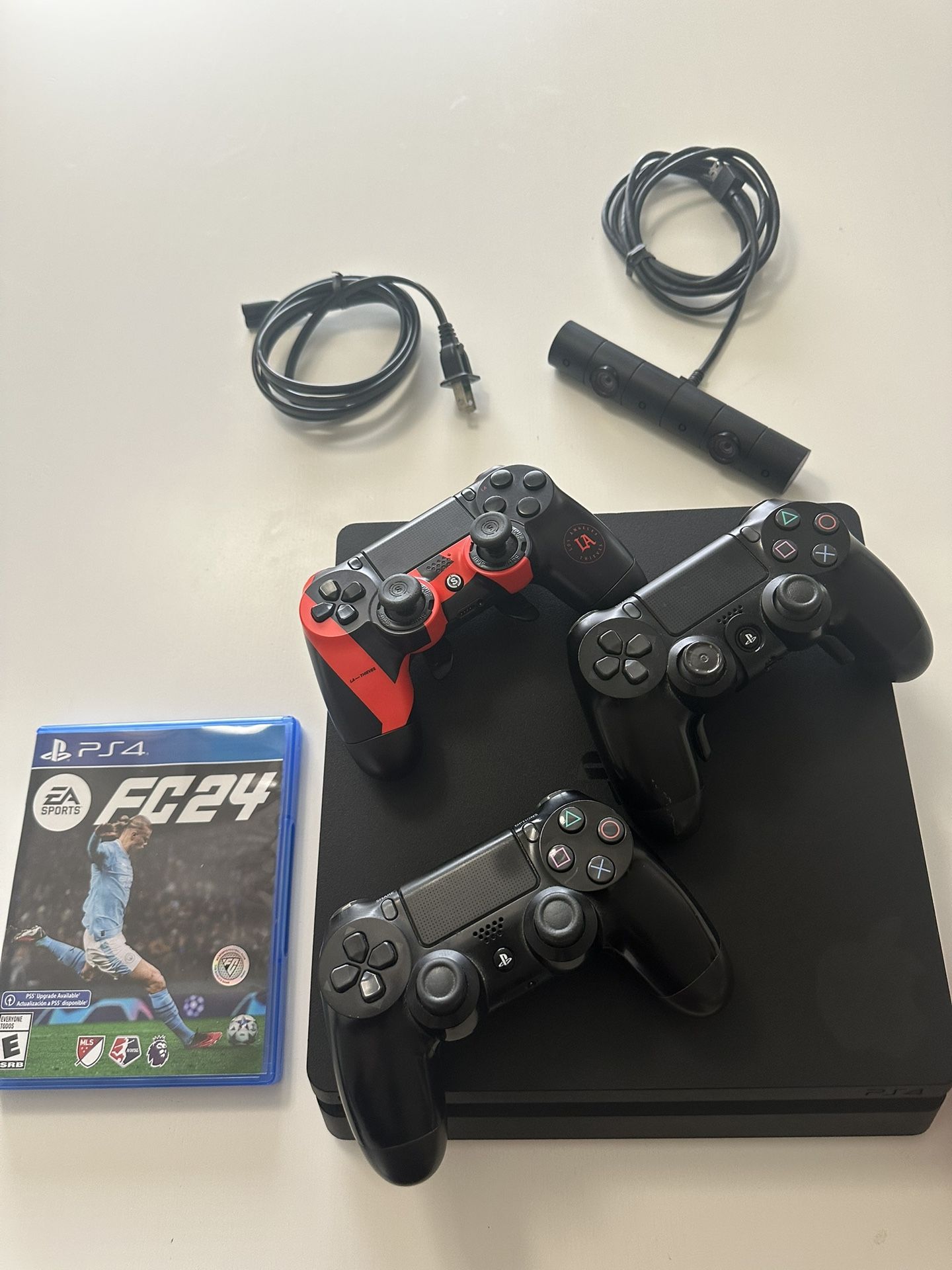 PlayStation 4 Slim 1TB with 3 Controllers