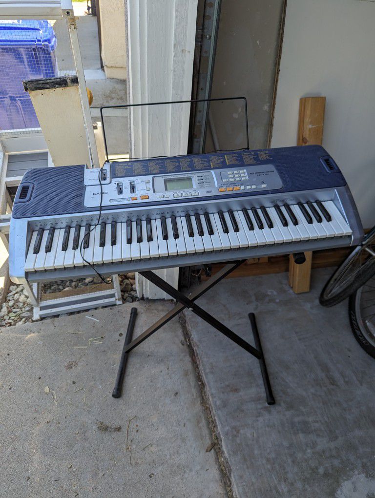 Casio Electric Keyboard And Stand