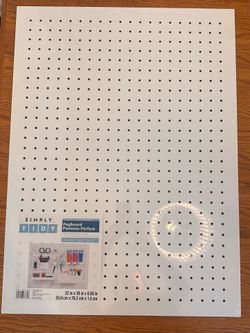 $35 - Brand new in package.  Simply Tidy Metal Pegboard (22” x 30”) is a steel, wall-mounted storage panel designed to organize craft supplies, office