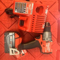 Milwaukee M18 FUEL 18V Lithium-Ion Brushless Cordless Hammer Drill and battery 5.0 and charger