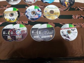 XBOX 360 with games and 2 controllers and charger. $150 OBO.