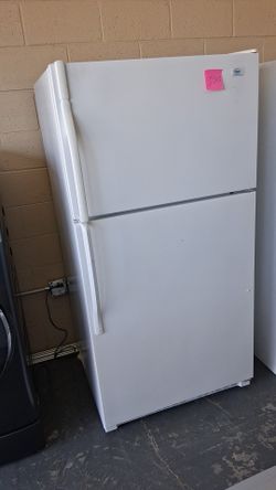 Nice roper white top and bottom refrigerator