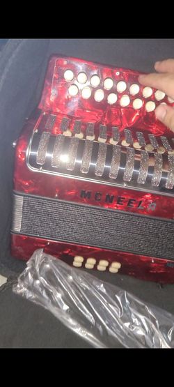 Mc Neela red accordion