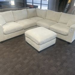 Cream Comfy Sectional And Ottoman 