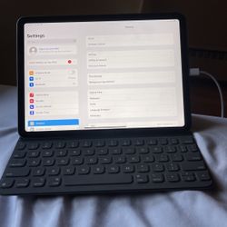 Ipad With Keyboard And JBL Speaker