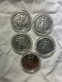 Five 90% silver walking liberty half dollars