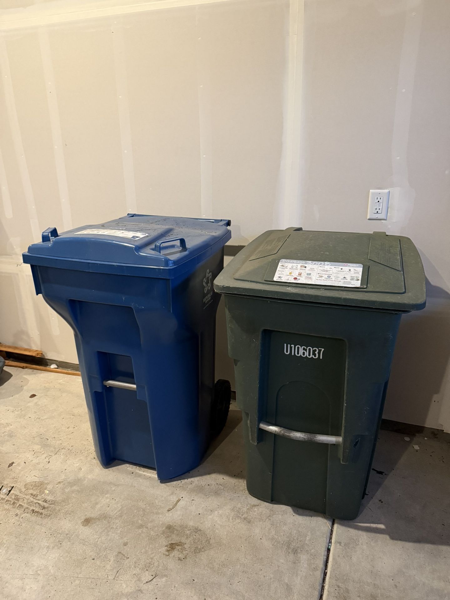 64 gallon trash bins x2