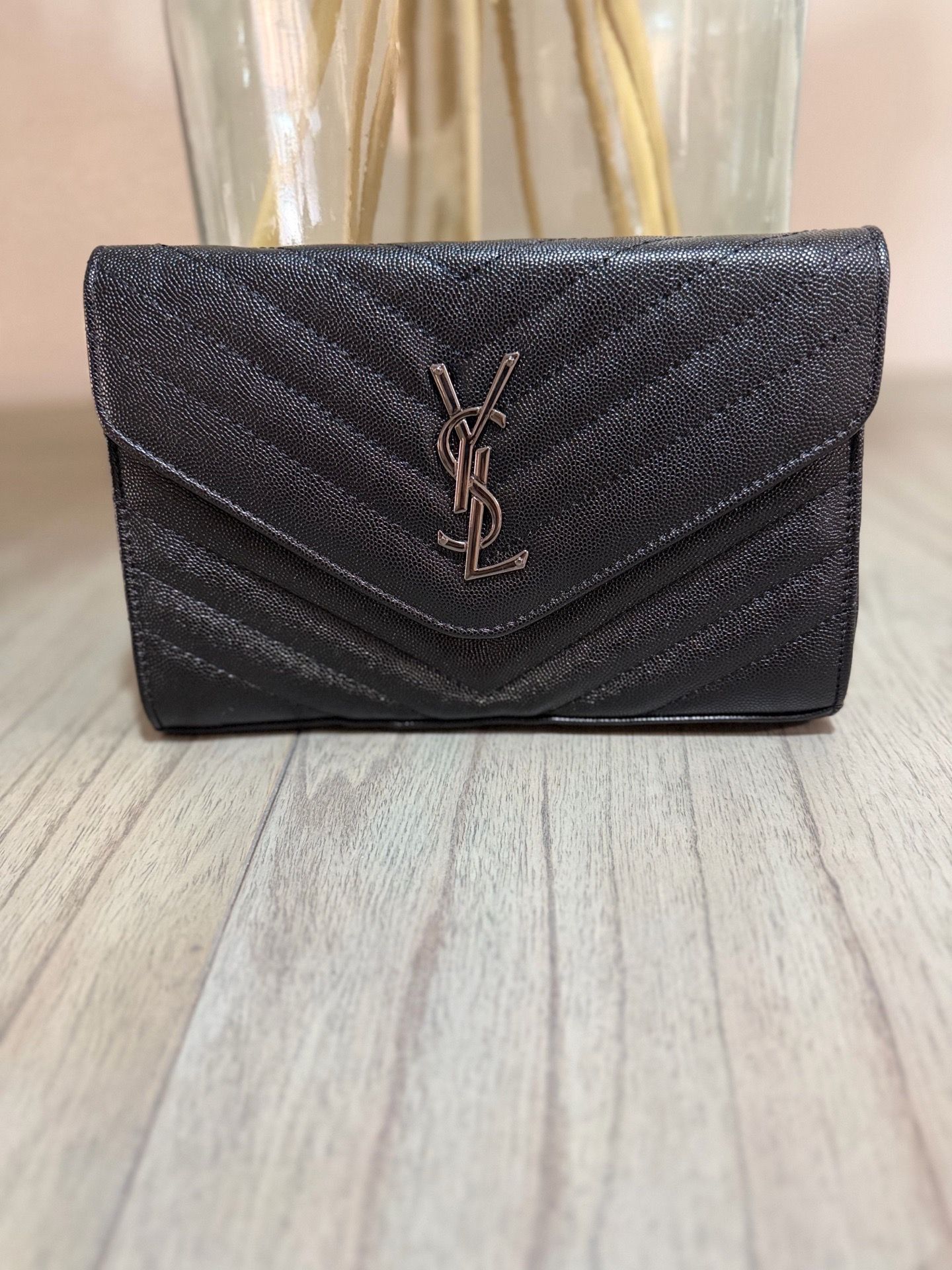 Medium sized black shoulder bag