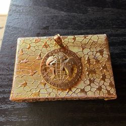 the world is yours pendant