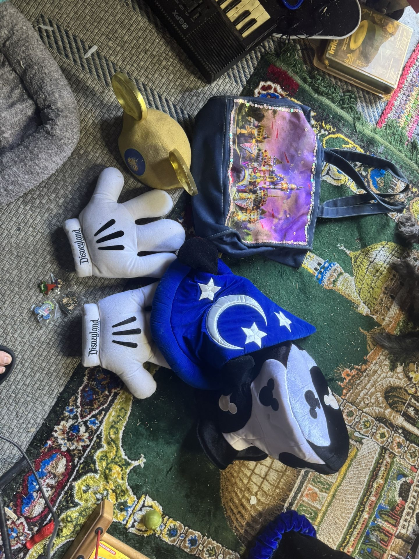 Collectable Disney Memorabilia Collector pins,, Hats, Bag And Gloves!! Three Hats, four pins, one is the 50th Anniversary Hat & two anniversary pins. 