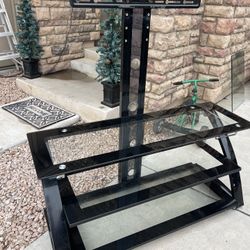 Free Tv Stand. Have A Tv Also That Has Lines Thru It But Still Works. 