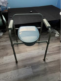 Bedside commode/ portable toilet