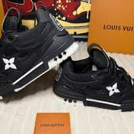 Louis Vuitton LV Skate Sneakers in a black and white colorway.