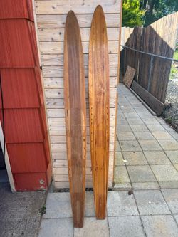 Pair of vintage wooden water skis