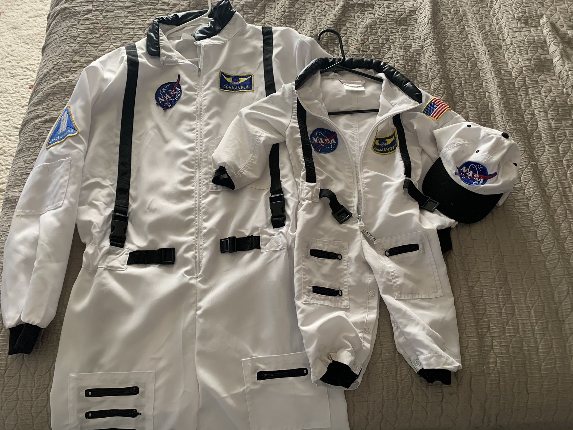 Matching adult and baby/toddler astronaut costumes, perfect for Halloween or a themed party. Baby/toddler size 18m but fit out 24 month old, adult is 