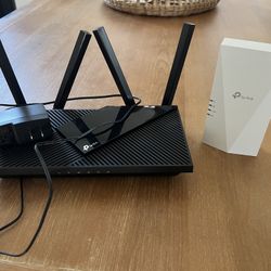Tp link dual band ax 3000 router and TP link AX 1500 booster