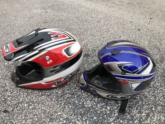 2 helmets red is medium, blue is small