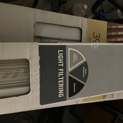 New in box 1 inch vinyl blind. Size is 52 inches wide by 64 inched Color is Alabaster. Light filtering.Ready to install.