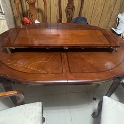 Wooden table and 6 chairs