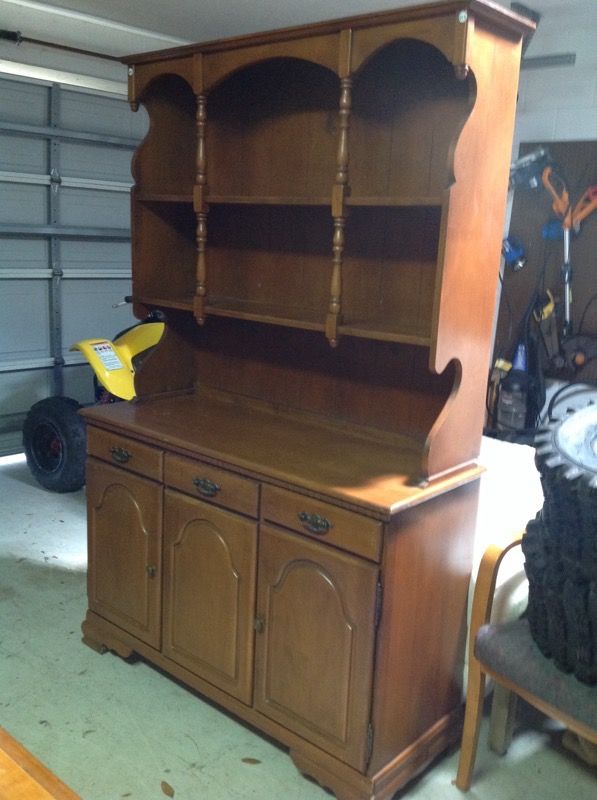 Country style solid wood hutch with two shelves, three drawers and two cupboards with extra storage