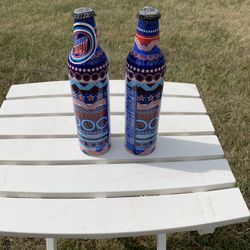 Two Vintage Mountain Dew Aluminum Pop Bottles With "Star And Circle" Pattern