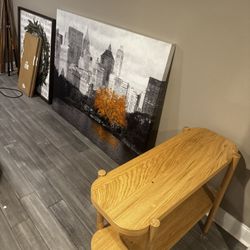 Pull Out Couch , Marble Table , Long Grey Mirror , Big Picture 