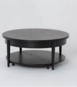 Round lift top coffee table
