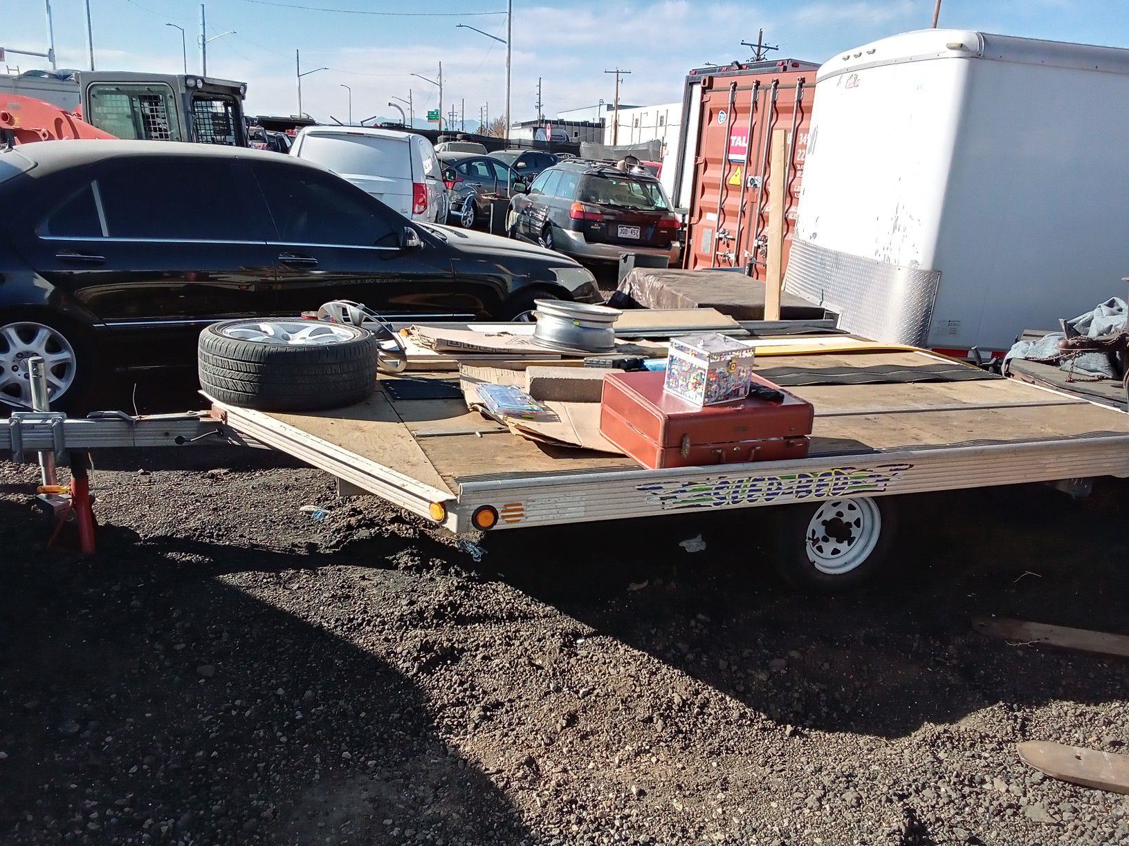 Snowmobile trailer brand new axle and it lets up and down on its own