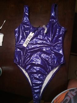 Tick toc brand latex swim suit or body suit