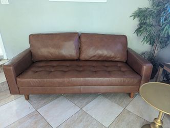 Brown 🤎 Leather couch