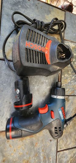 Drill, 2 Batteries And Charger 