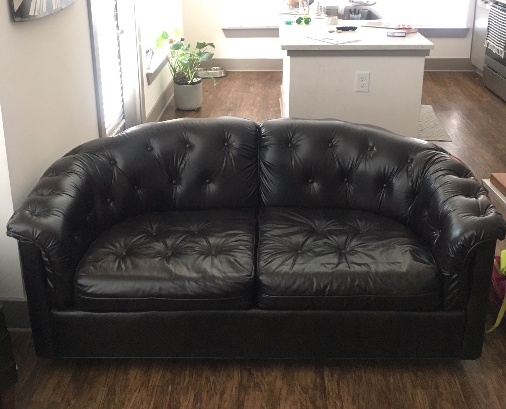 Tufted loveseat sofa