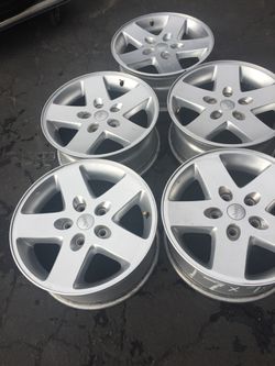 Jeep wheels 16” all 5 wheels only $375 For more inf cal Best tire visalia
