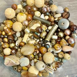 Vintage brown and tan  beads. All different shades of brown and  and sizes. As is. No returns. Make me an offer I can’t refuse. Please feel free to co
