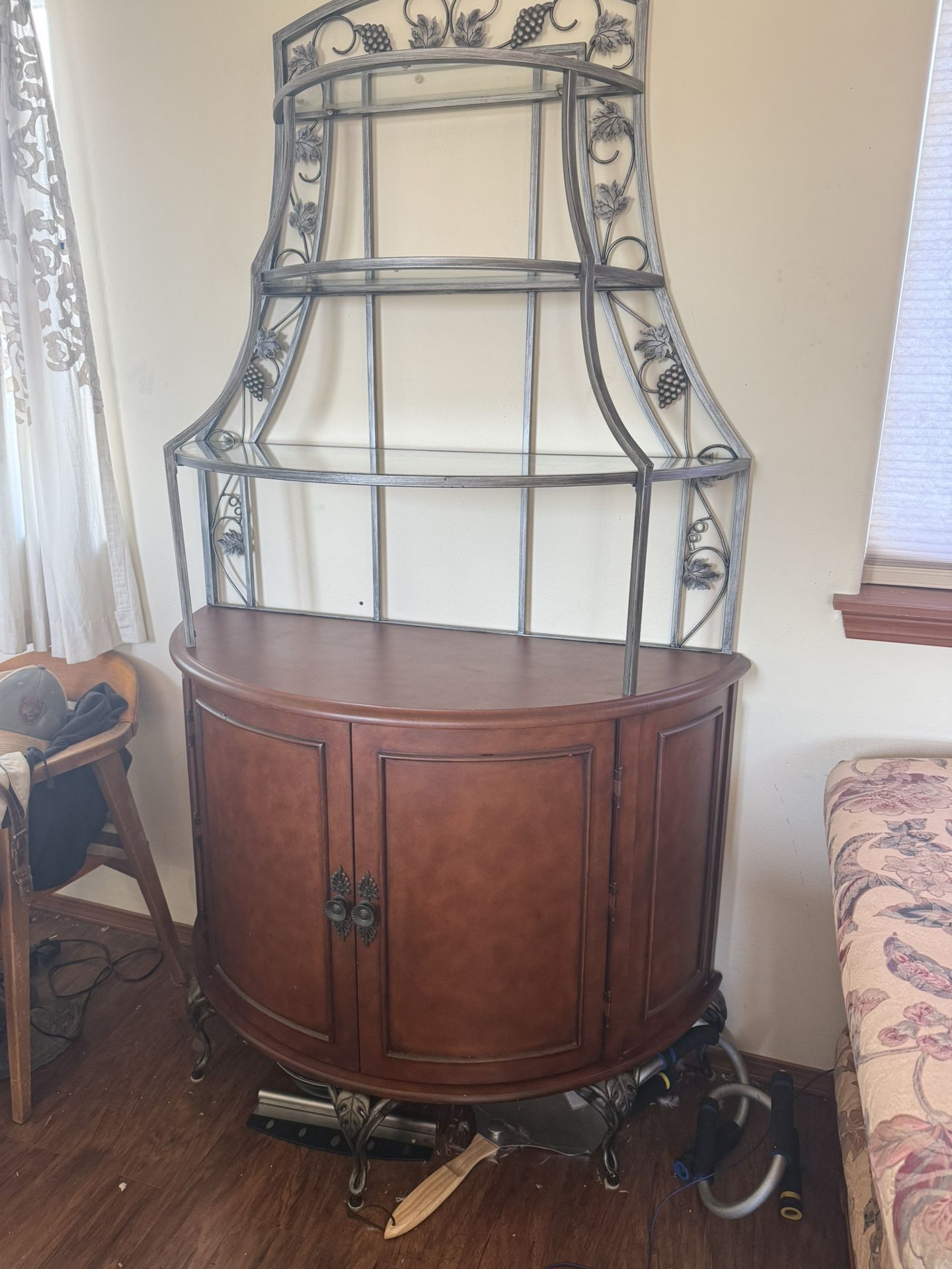 Bowfront Bakers Rack – Ornate Ironwork & Faux Leather Accents