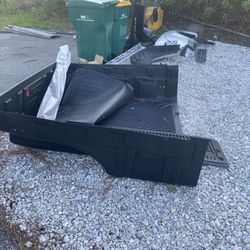 Nissian Frontier bed liner and bed trim