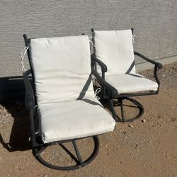 Two Chairs With Tie On Cushions 