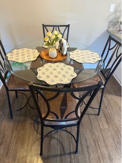 Glass table  with four barstool chairs