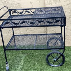 Wrought iron outdoor with sliding shelf