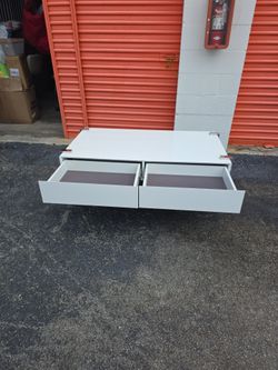 Coffee table with glass and storage drawers