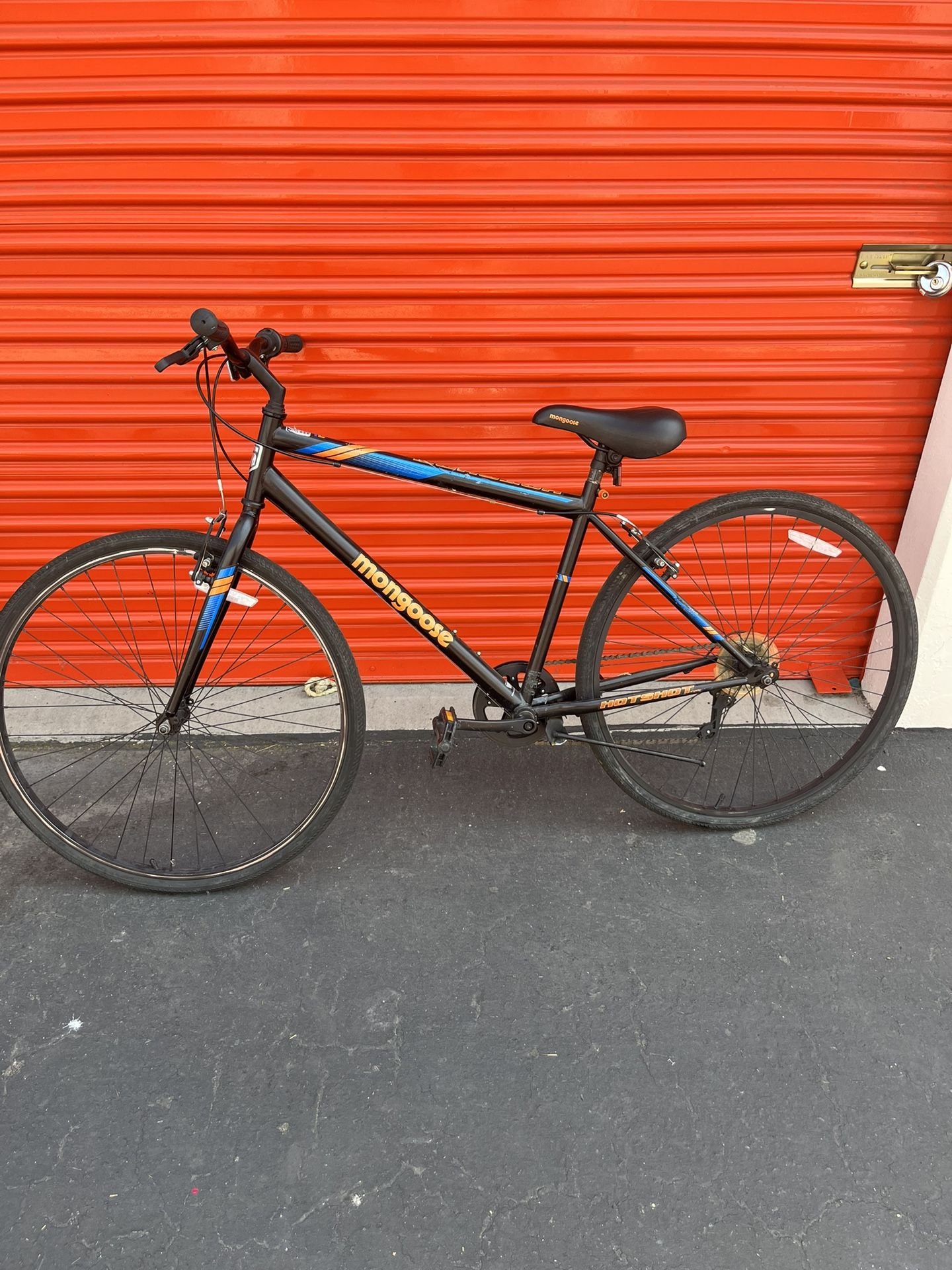 Mongoose Hotshot Hybrid Bike, speed, 700c wheels, Black Orange