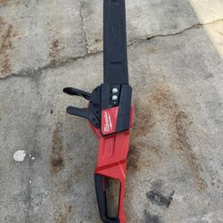 Milwaukee M18 FUEL cordless chainsaw in almost new condition.
