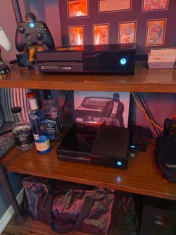 "2 "  Xbox One's  with 13 games  & 2 controllers
