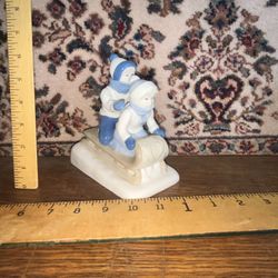 Vintage Porcelain Kids Sledding 